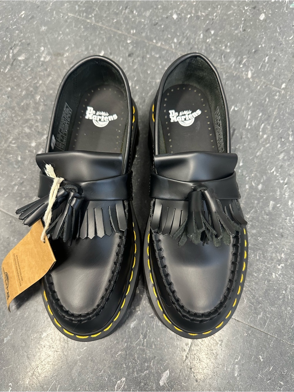 Dr. Martens Black Kiltie Tassel Loafers with Yellow Stitching